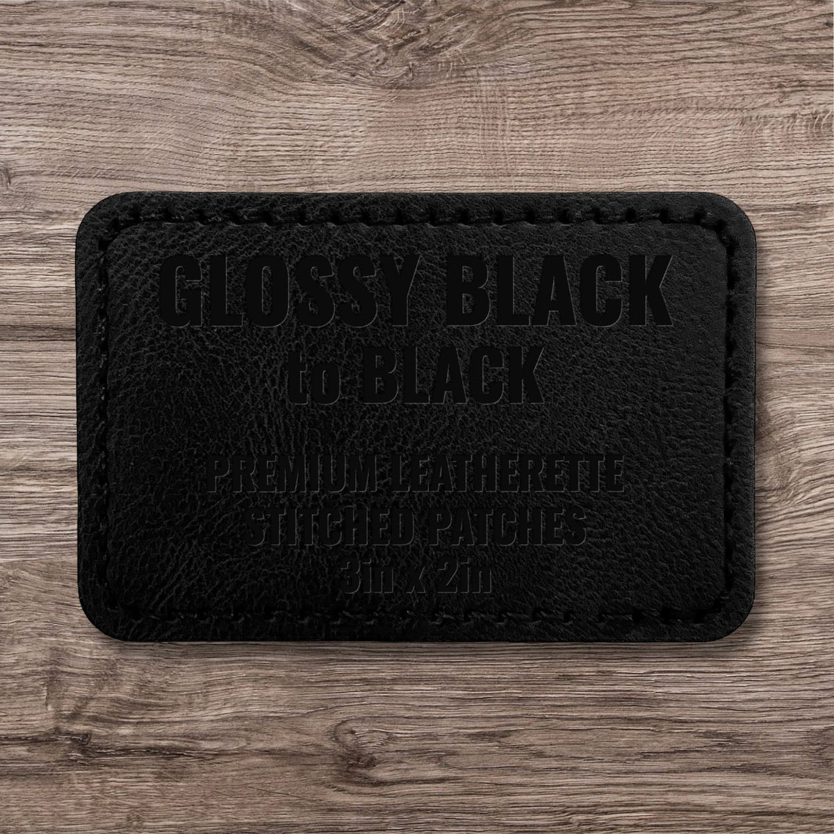 Glossy Black premium leatherette stitched patch with black stitching